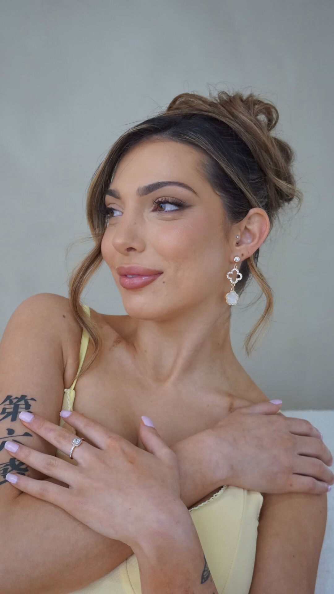 A special occasion look with a soft smoky eye and a glossy nude lip